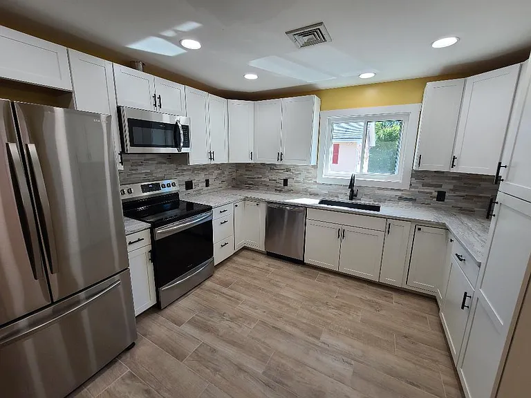 1037 Calef Hwy — Photo 2