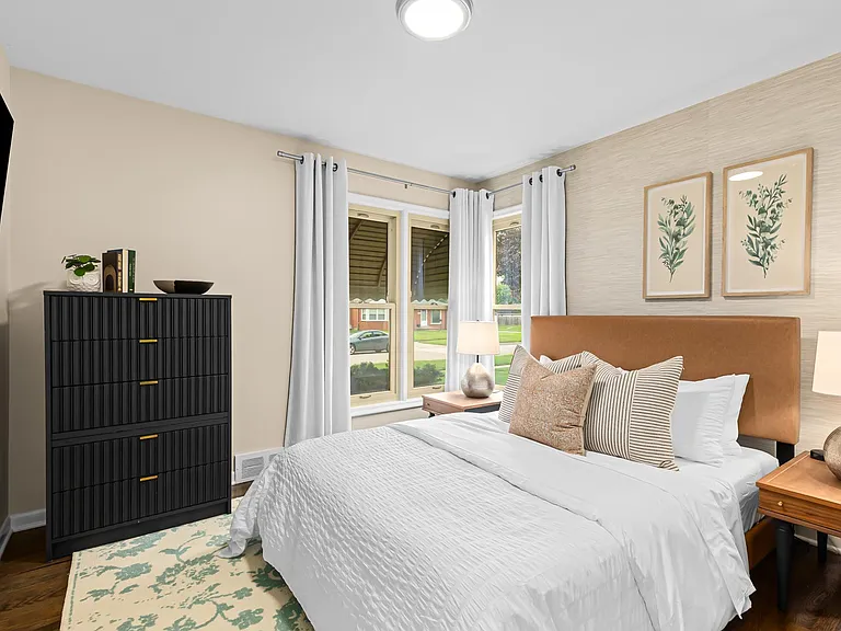 The queen-size bed is perfect for couples or families.