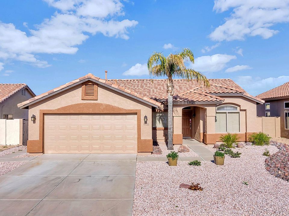 10772 W Louise Dr-large-001-3-Front Exte