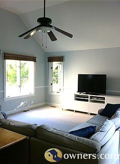 Family Room with cathedral ceilings, 3 walls of windows