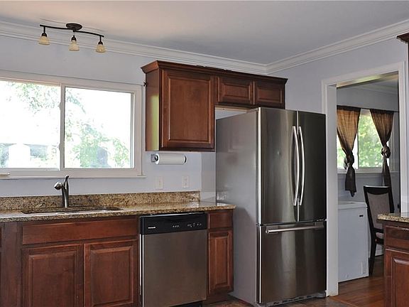 Kitchen with stainless steel appliances and granite counter tops