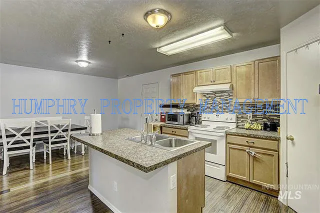 9963 W Tilmont St — Photo 7