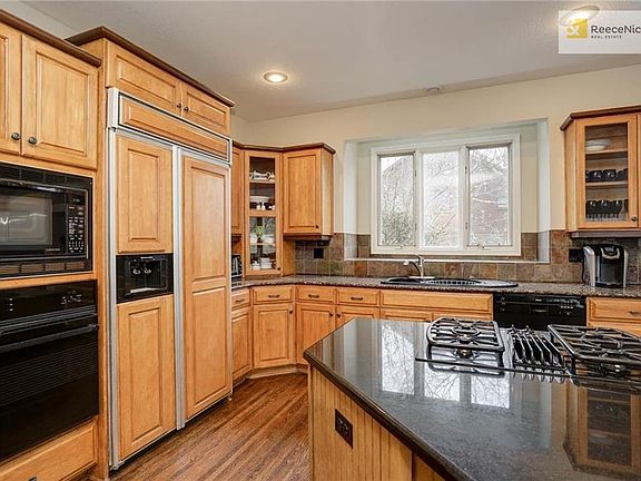 Built-in refrigerator is another upgraded feature in this Kitchen.