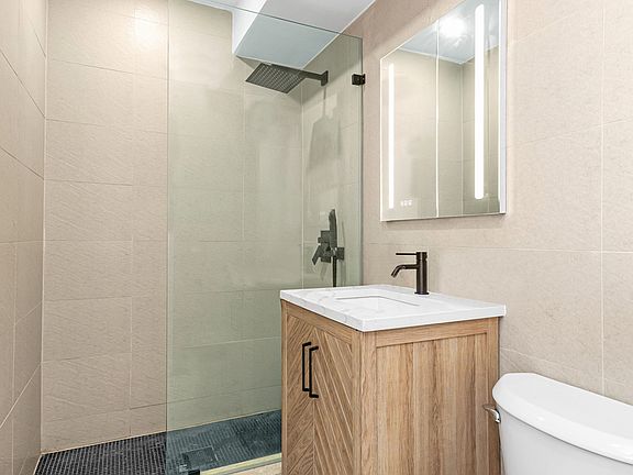 5th image of 228 E 25th St APT 8