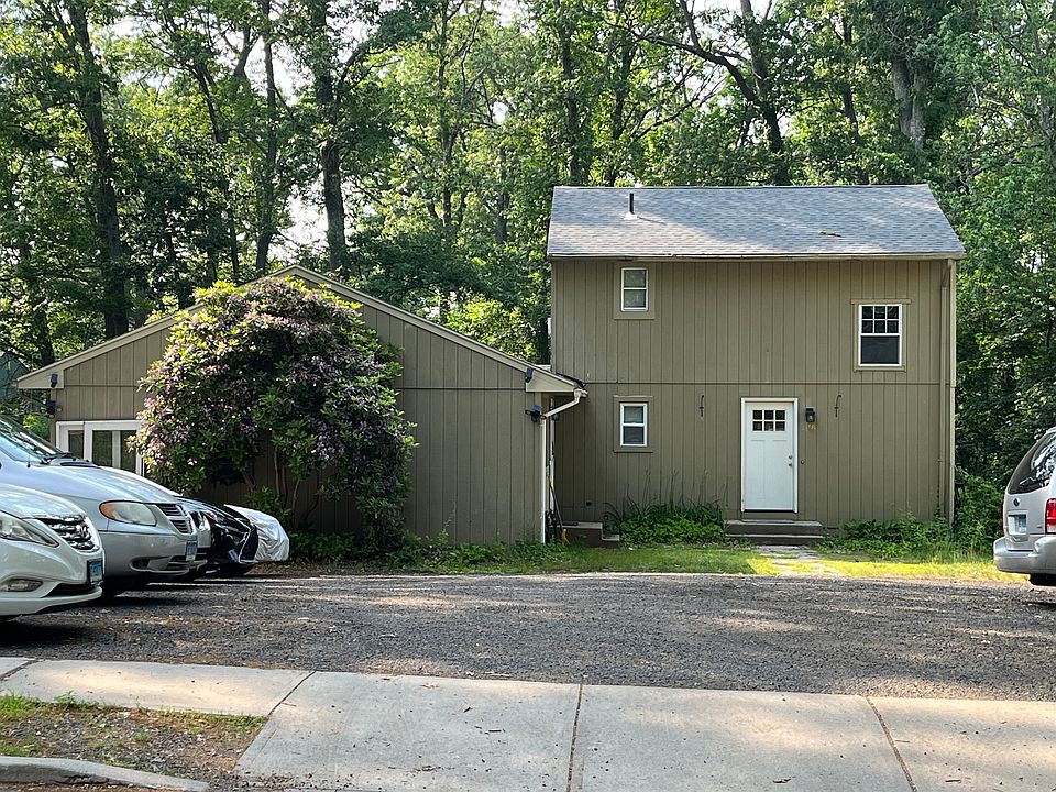 Front of Colonial home-Property has 2 separate homes. Ranch home is on the left.