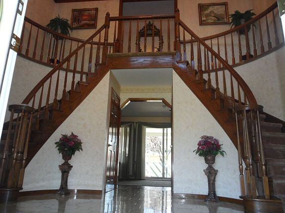 double staircase foyer entrance