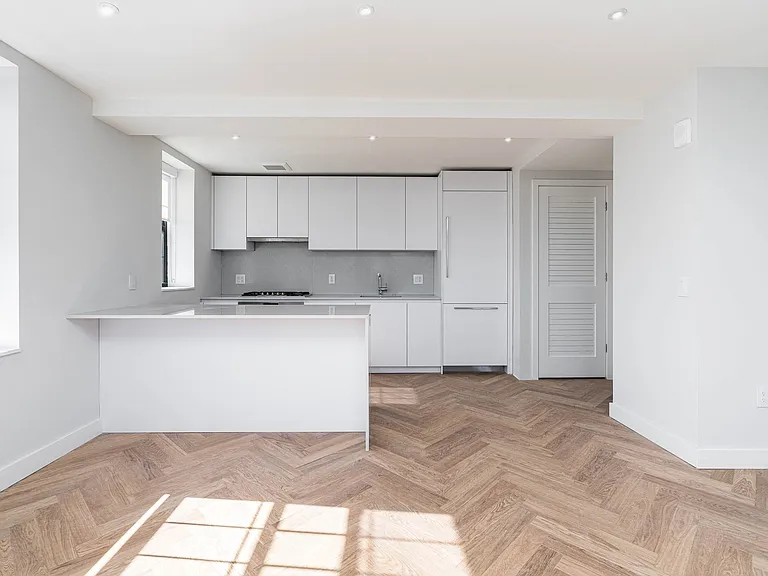 The Stanton luxury unit with hardwood floors and quartz countertops