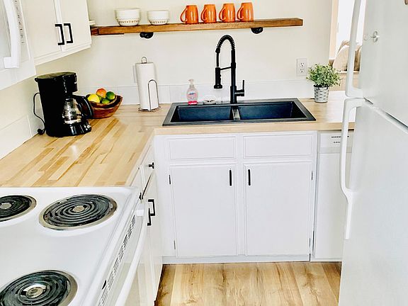 Newly updated floors, counters and more! This kitchen is well equipped and move in ready.
