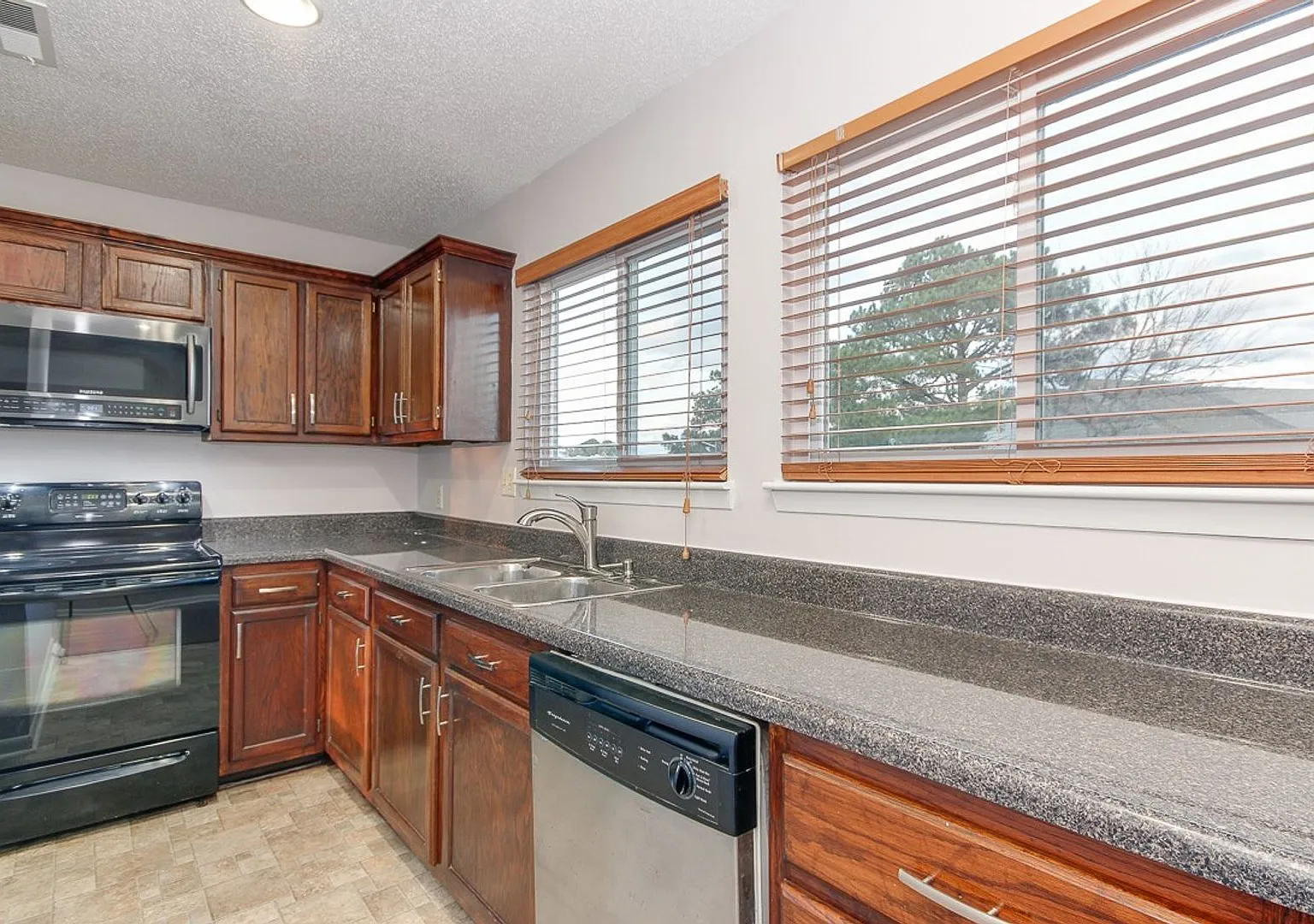Surprisingly Spacious 3-Story Townhome With Garage and Huge Back Yard — Photo 3