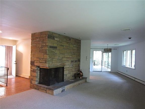Living room, dining room and fireplace