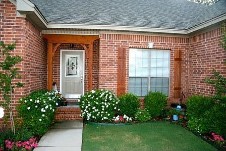 custom cedar archway and shutters