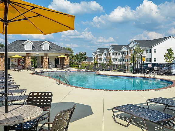 Sparkling Outdoor Pool and Sundeck