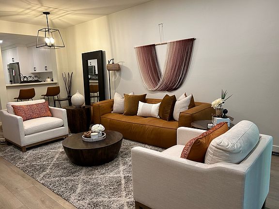 Living room facing kitchen.