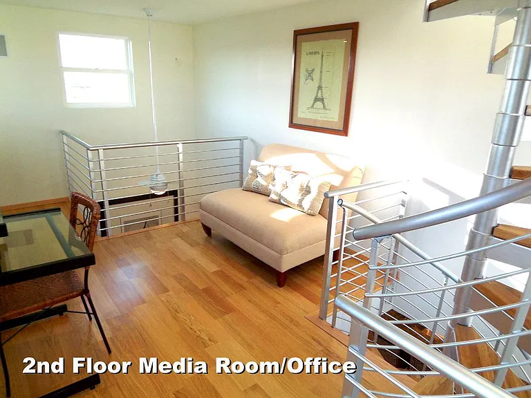 The light-filled Office/Media Loft is the perfect live/work space.