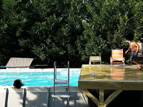 Large above ground saltwater pool with electric hookups at d