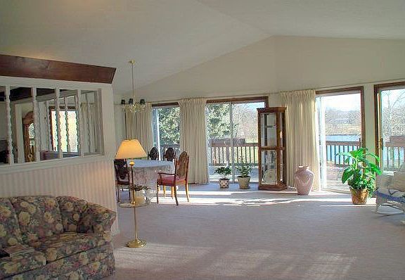 Living room opens up to wrap around deck