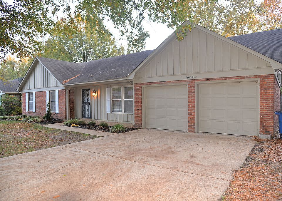 Brick w/ newly painted trim