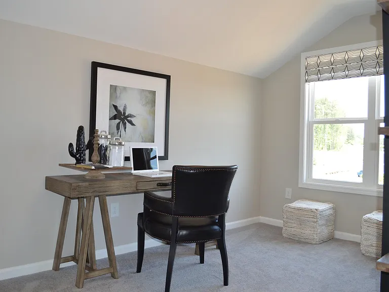 The third bedroom across the hall can be set up however you choose.