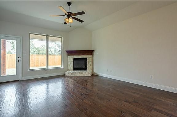 great room with stone fireplace