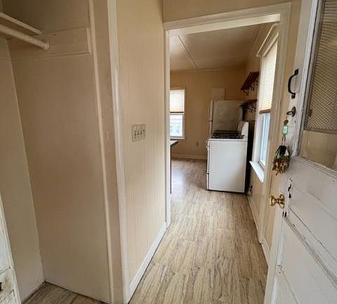 Entry from porch - Coat closet on left