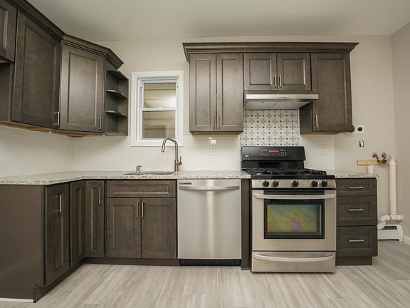 Brand new kitchen with dishwasher and washer dryer hook up