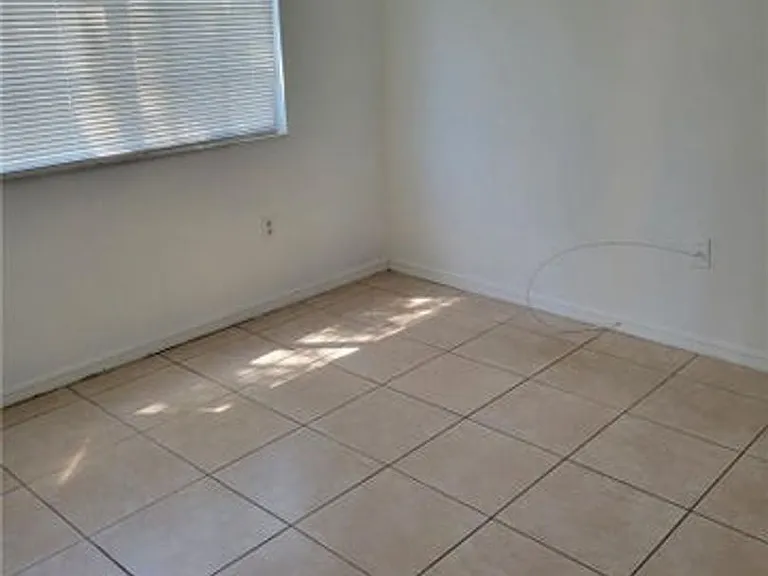 5005 Wiles Rd #108 — Photo 9