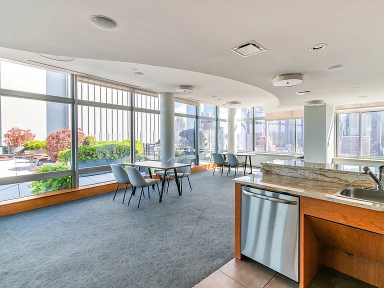 Resident lounge with kitchenette and co-working spaces