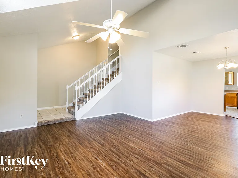 7447 Woodland West Dr — Photo 3