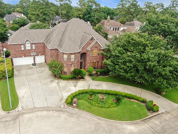 Tucked in a Cul-de-Sac with double wide driveway and circular driveway.