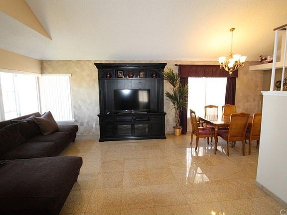 Formal Living room and Dining room Combo. With a Lovely stair case.