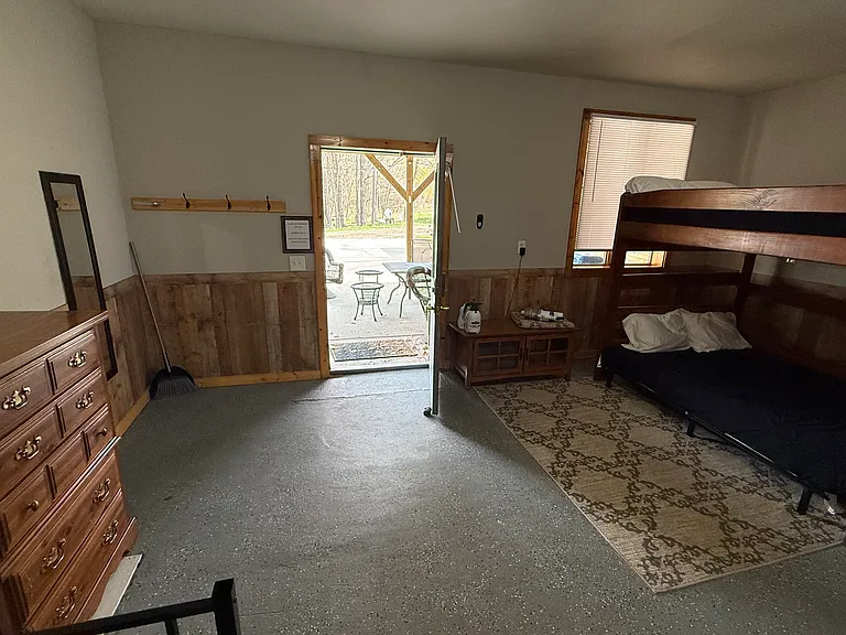 A new bedroom was added where the queen bunks are. The room now has a single queen bed.