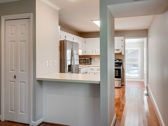 open floor plan - looking in kitchen and to flex room