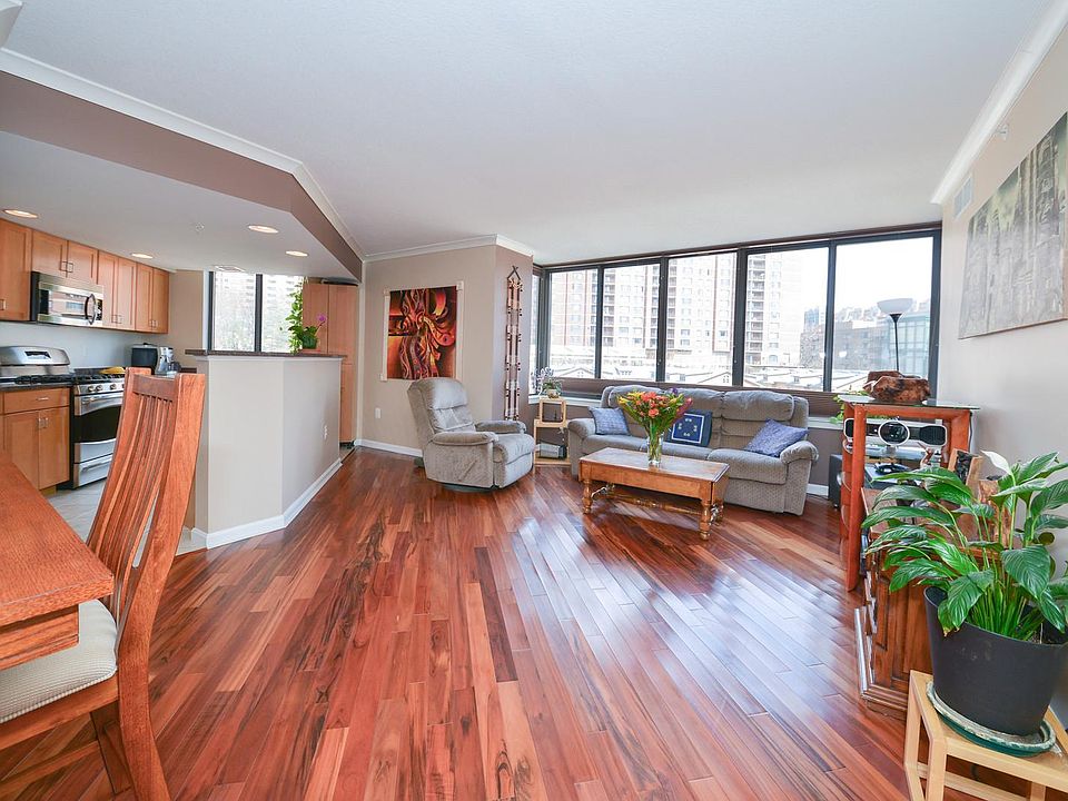 Open floor dining and living room with hard wood floors