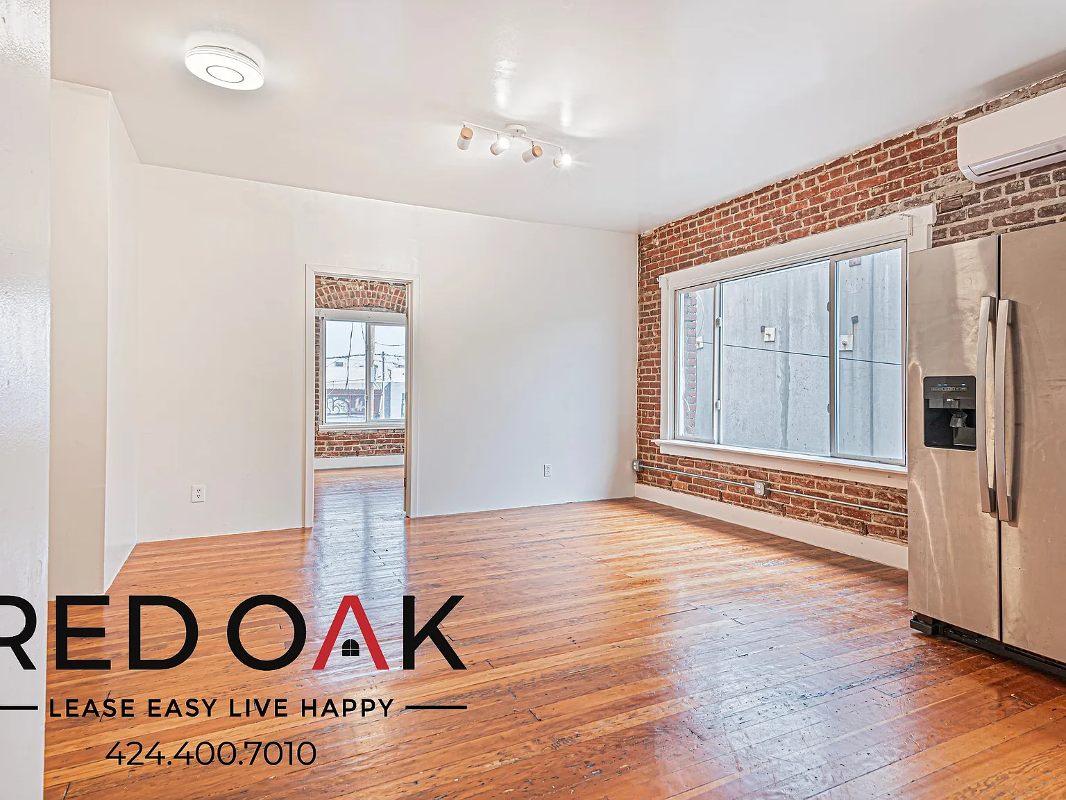 Welcoming 1-Bed with Exposed Brick and Stainless Steel Appliances ~ In Historic South-Central! — Photo 4