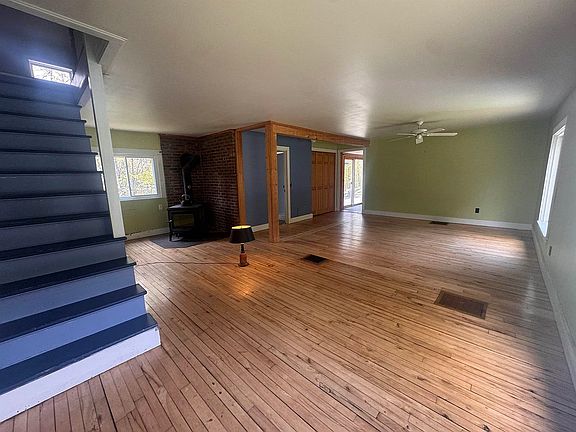 Large open floor plan living could strategically placed furniture could create 2-3 separate spaces