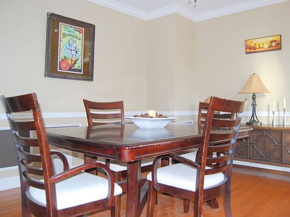 Dining Room with hardwood floors and chair rail