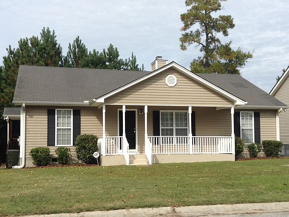 front of house - side entry on left