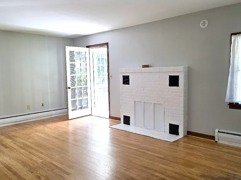 bright spacious living room with walk out to terrace