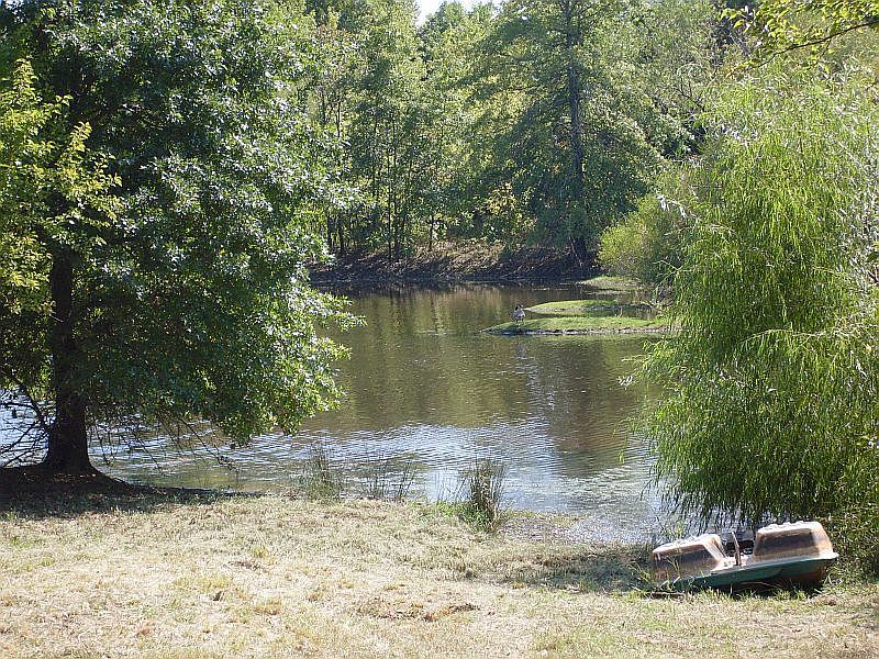 Pond/Pit
						:
						Fully stocked with trophy fish. apprx. 3 acre in size. sits behind main house.