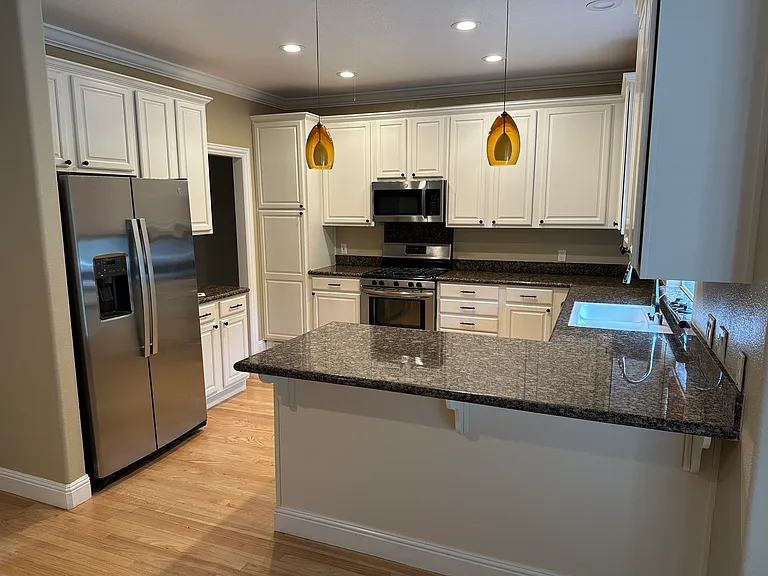 Kitchen, with counter seating area