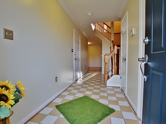 Foyer with custom tile