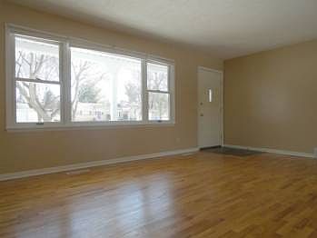 From the moment you first enter through the beautiful glossy finished front entrance door, you'll immediately recognize you're in a well maintained, well loved home!
