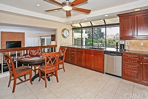 Large eat-in kitchen with view to back and opens to family room
