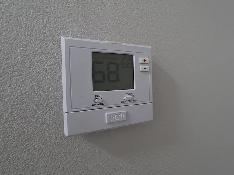 Programmable thermostat for convenient indoor temperature control.