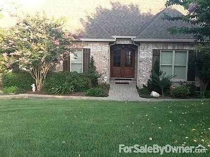 FRONT ENTRANCE
						:
						Solid wood and glass arched front doors