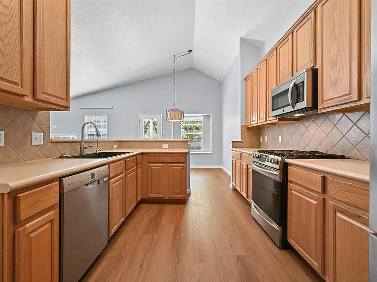 10317 Huxley St — Photo 13