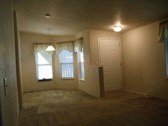 Cozy dining area and entrance door