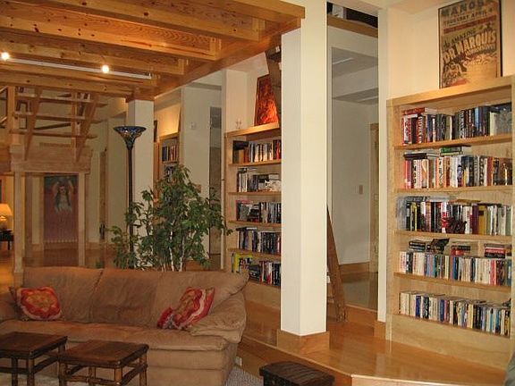 7 built-in bookcases of birds-eye maple