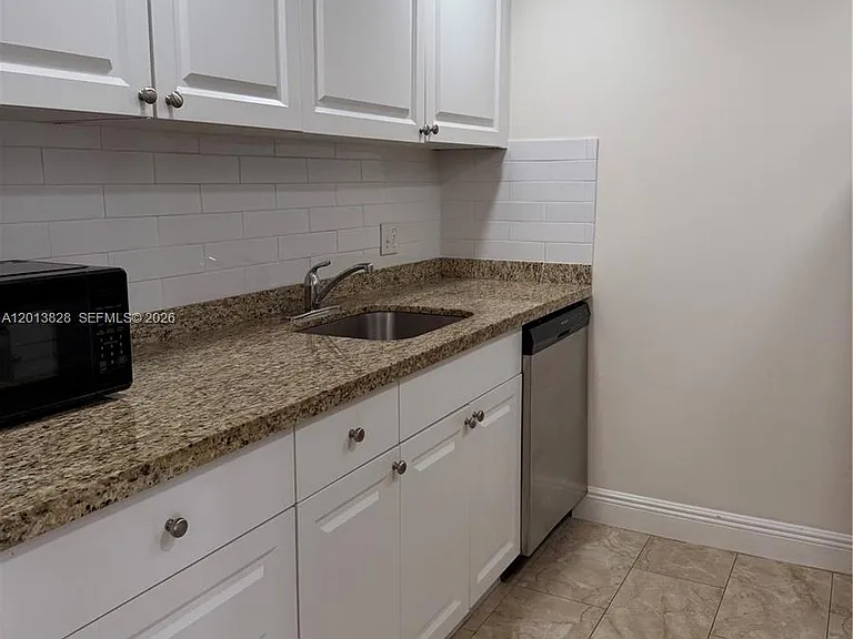 1551 SW 135th Ter #311G — Photo 2