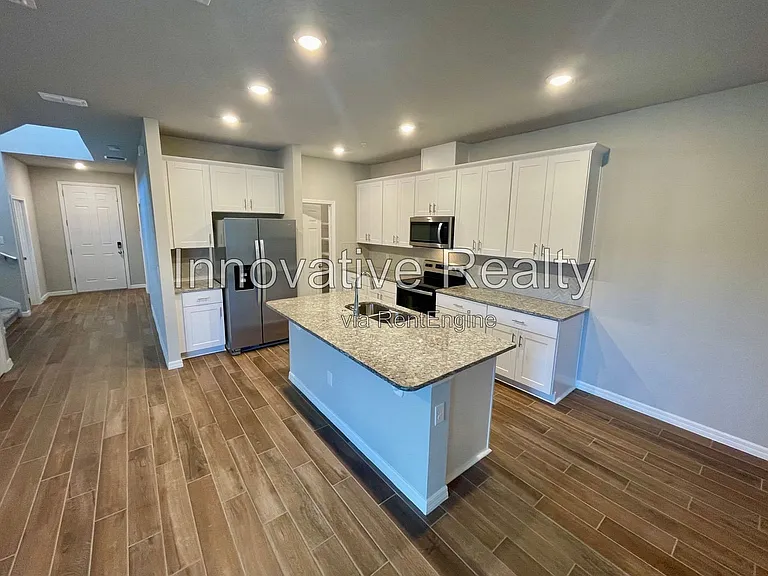 1016 Legacy Winds Way — Photo 3
